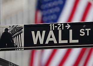 Wall Street limitó sus pérdidas y terminó dispar
